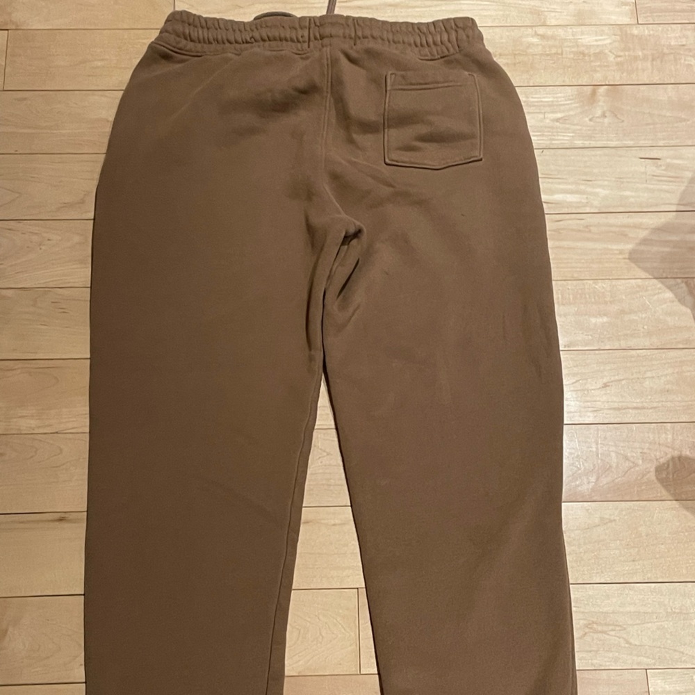 Men’s Hollister sweatpants brown with sports logos, size Small